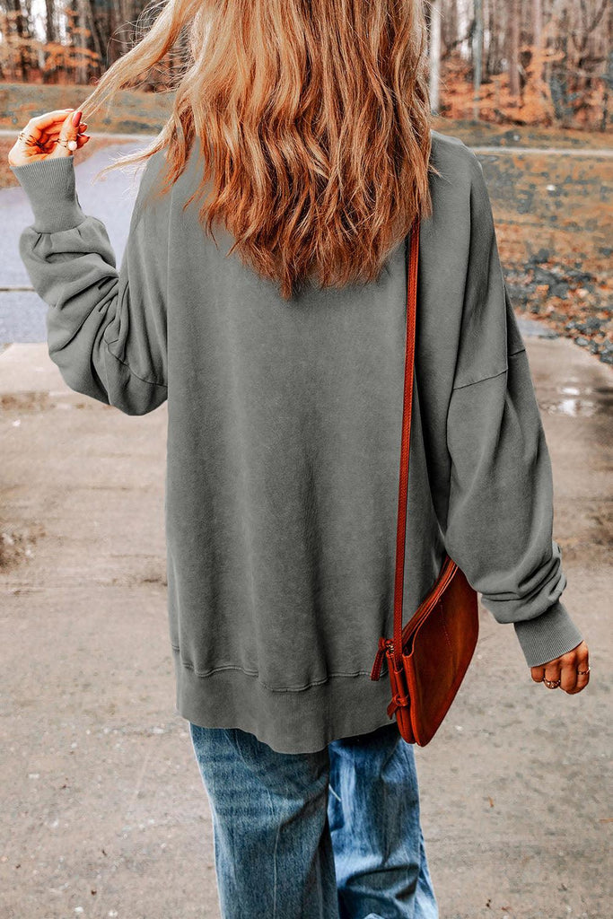 Dropped Shoulder Round Neck Long Sleeve Blouse - Tran.scend 